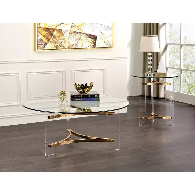 Table Basse Finition Dorée : Plateau Rond en Verre Trempé, Compartiment de Rangement, Structure en Métal Thermolaqué