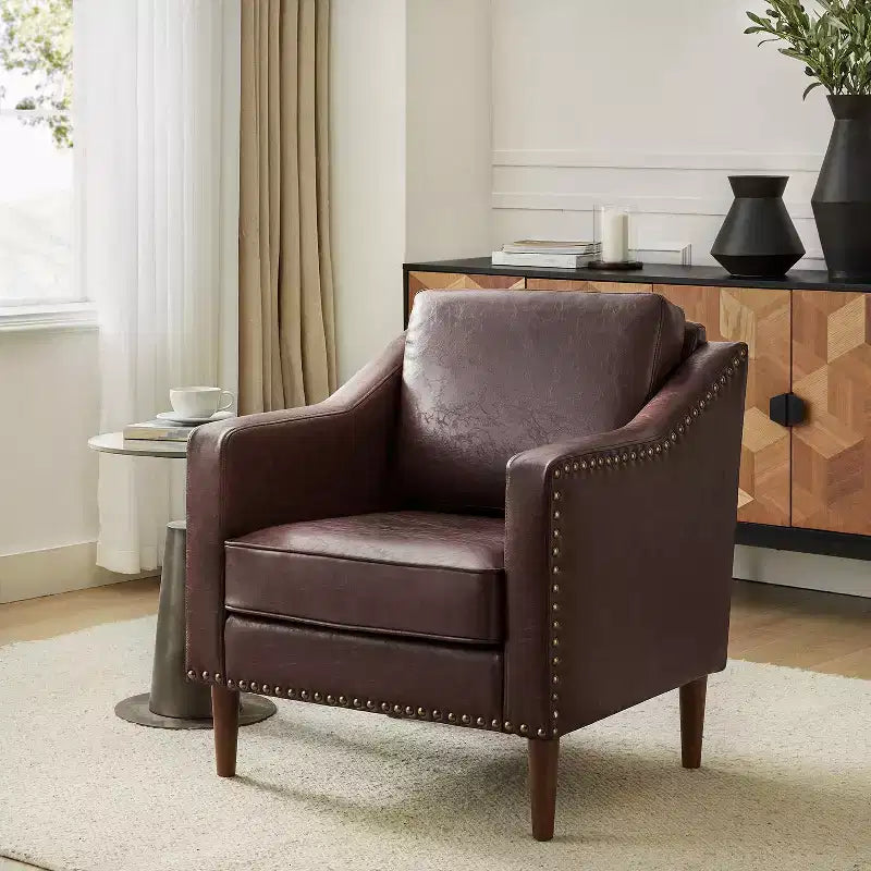 Fauteuil en cuir végétalien de transition avec coussin d'assise amovible et clous décoratifs