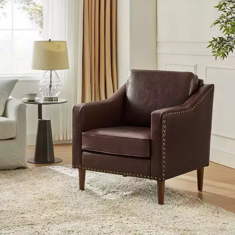Fauteuil en cuir végétalien de transition avec coussin d'assise amovible et clous décoratifs