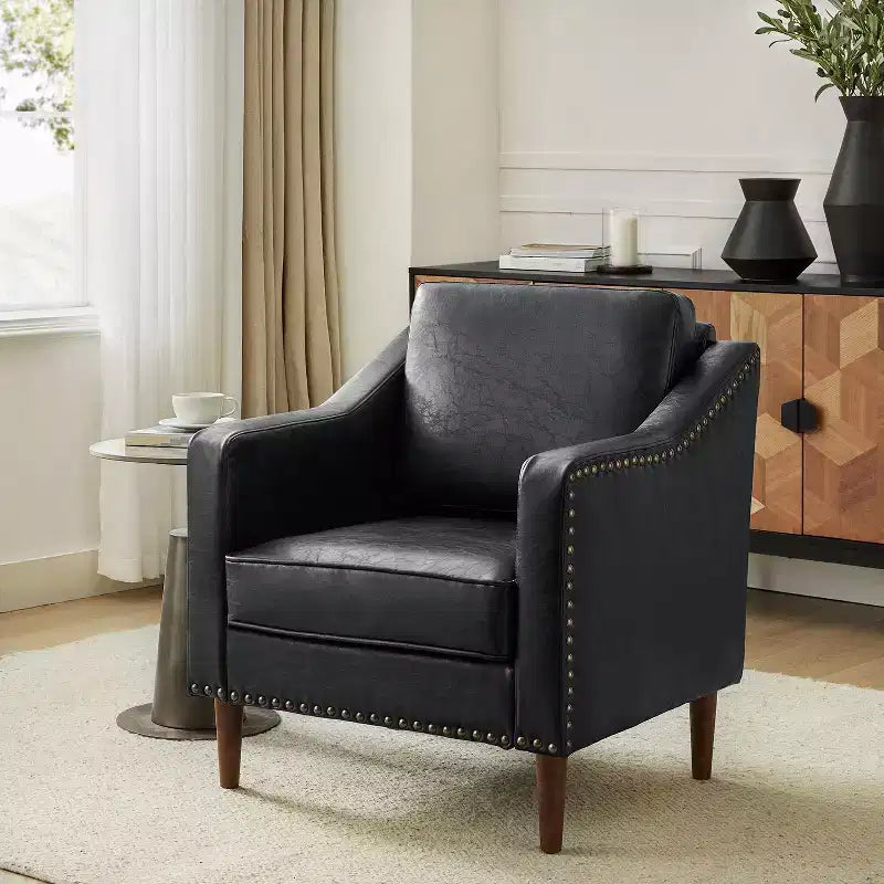 Fauteuil en cuir végétalien de transition avec coussin d'assise amovible et clous décoratifs