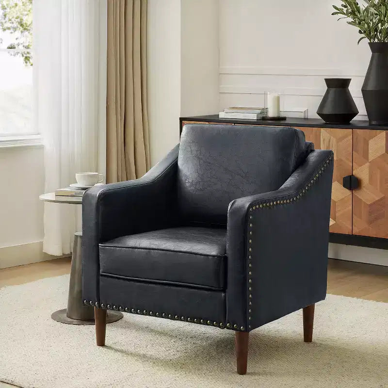 Fauteuil en cuir végétalien de transition avec coussin d'assise amovible et clous décoratifs