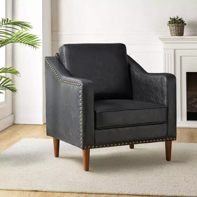 Fauteuil en cuir végétalien de transition avec coussin d'assise amovible et clous décoratifs