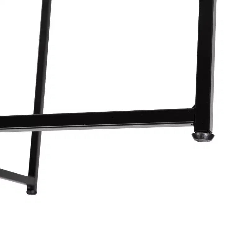 Table basse de salon en verre avec piètement en métal entrecroisé