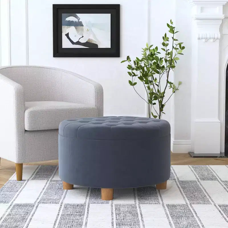 Pouffe de rangement rond capitonné en velours