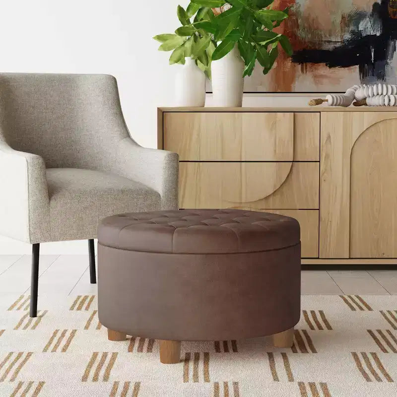 Pouffe de rangement rond capitonné en velours