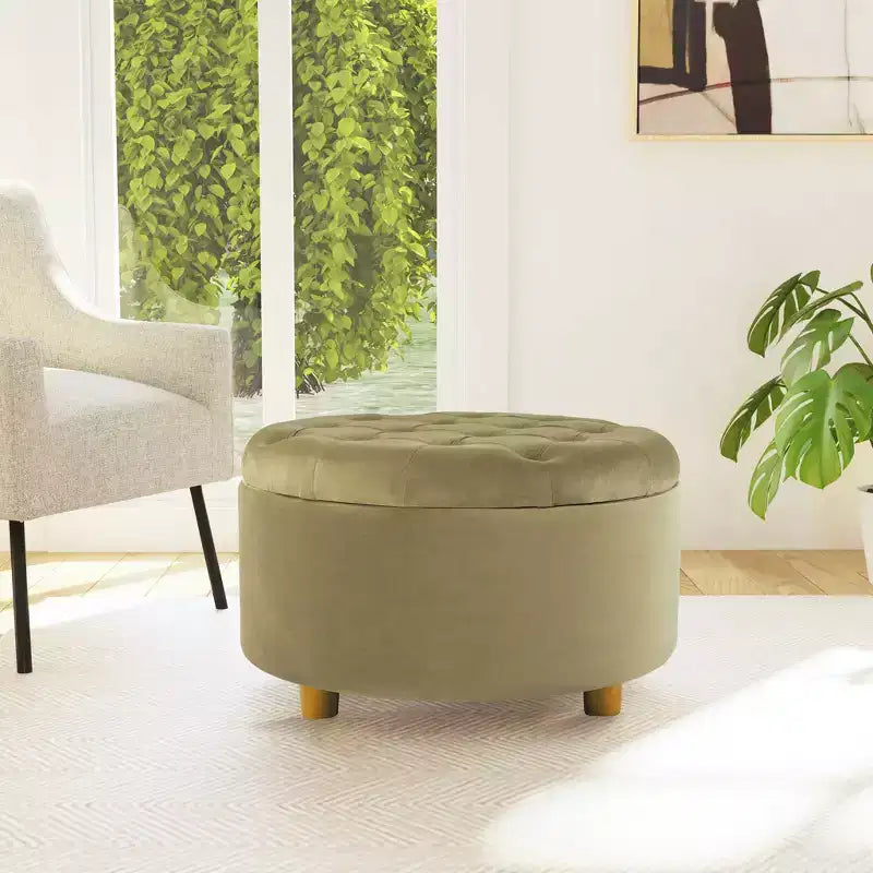 Pouffe de rangement rond capitonné en velours