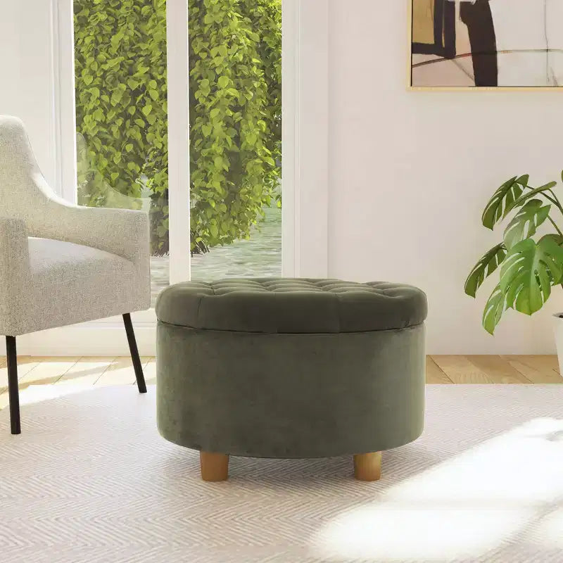Pouffe de rangement rond capitonné en velours
