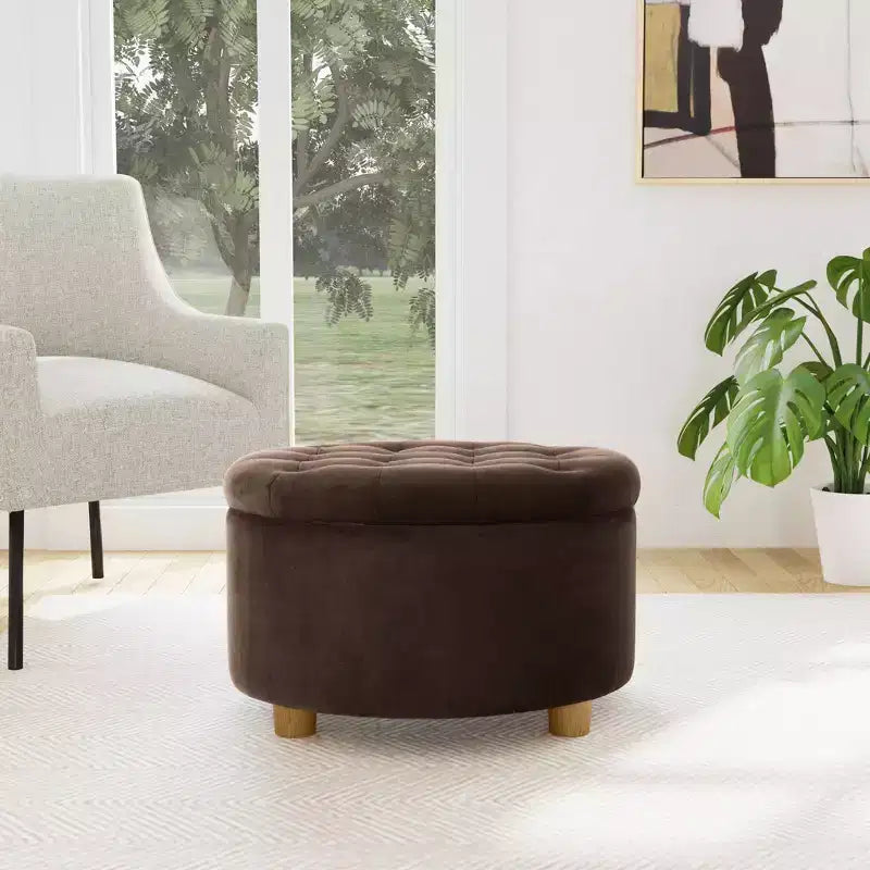 Pouffe de rangement rond capitonné en velours